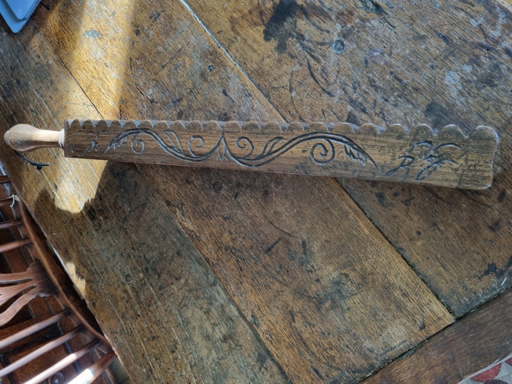 LARGE WELSH DATED AND CARVED TREEN LAUNDRY PADDLE View II