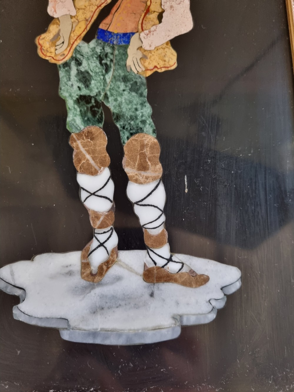 A 19th-century Italian pietre dure mosaic plaque depicting a shepherd boy in traditional dress within a moulded gilt frame. View IV