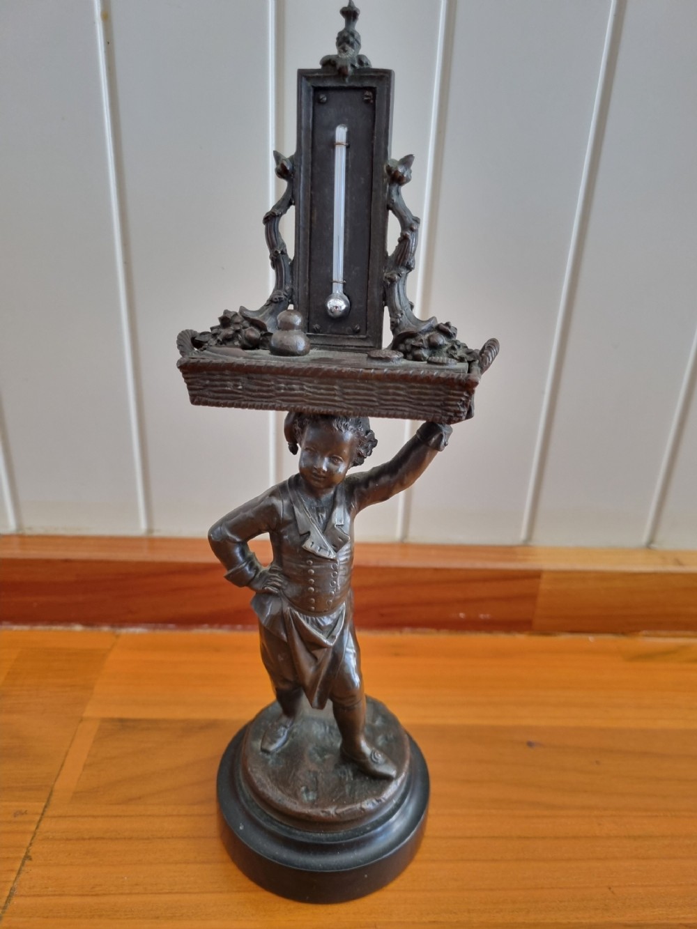 LATE 19THC ENDEARING BRONZE OF A BOY MATCHSTRIKER.