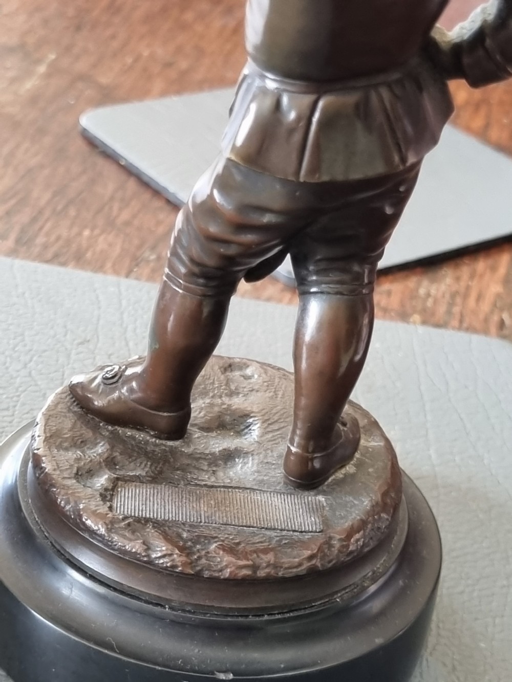 LATE 19THC ENDEARING BRONZE OF A BOY MATCHSTRIKER. View VI