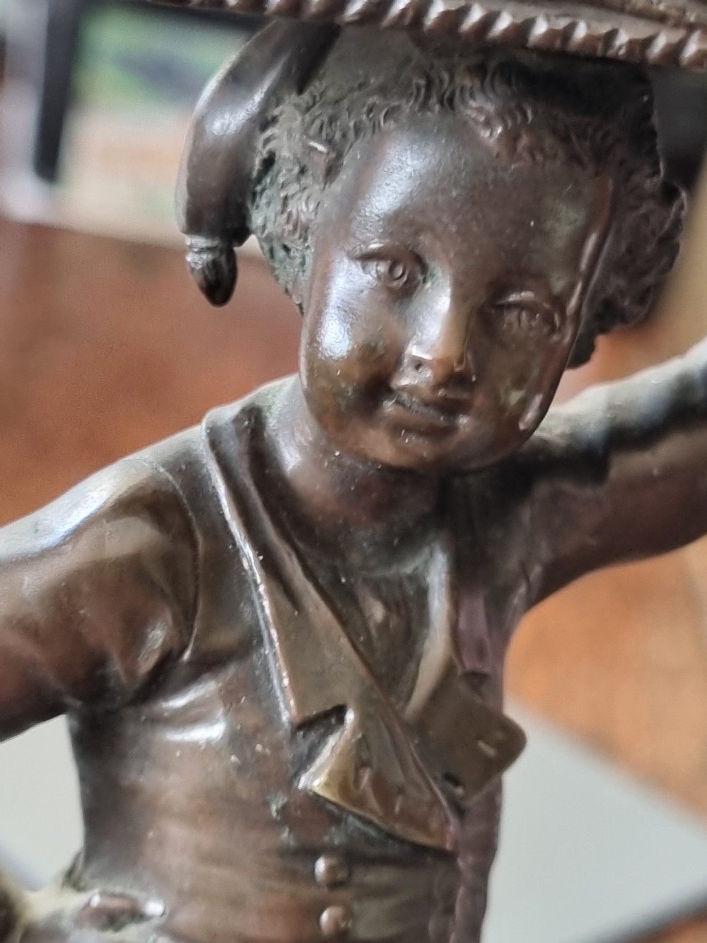 LATE 19THC ENDEARING BRONZE OF A BOY MATCHSTRIKER. View VIII