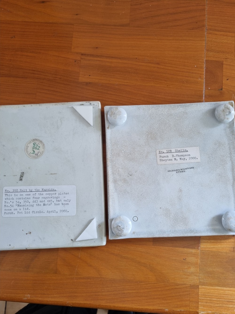 A pair of square Victorian Prattware ceramic teapot stands, one featuring a turquoise border with a marine shell medallion and the other featuring an ornate border with an equestrian scene. View VIII