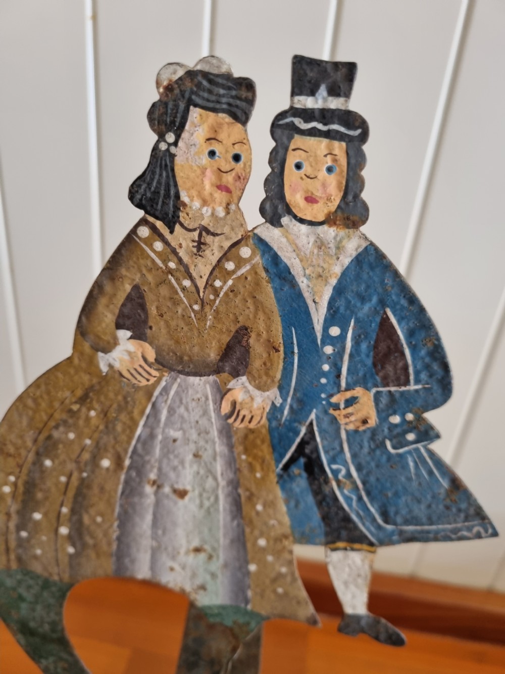 19THC METAL ROCKING TOY OF A COURTING COUPLE View II