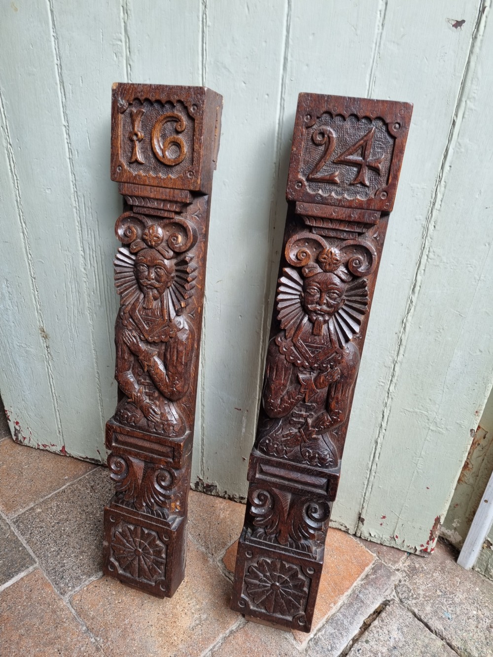 LARGE PAIR OF DATED OAK CARYATIDS 1624