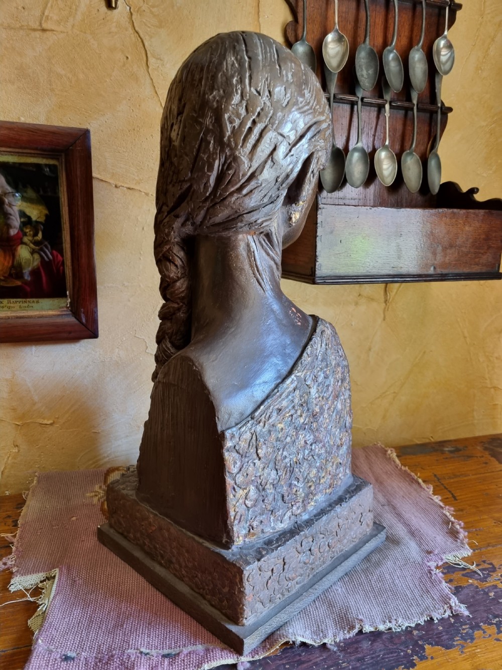 A LARGE TERRACOTA BUST OF 