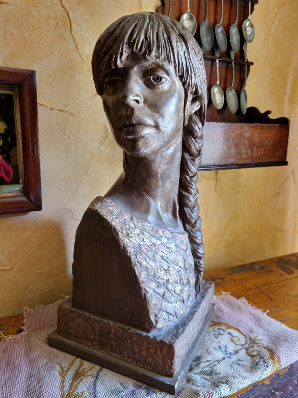 A LARGE TERRACOTA BUST OF 
