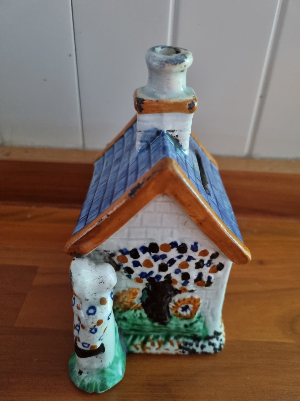 EARLY 19THC POTTERY MONEYBOX IN THE FORM OF A HOUSE
 View VI