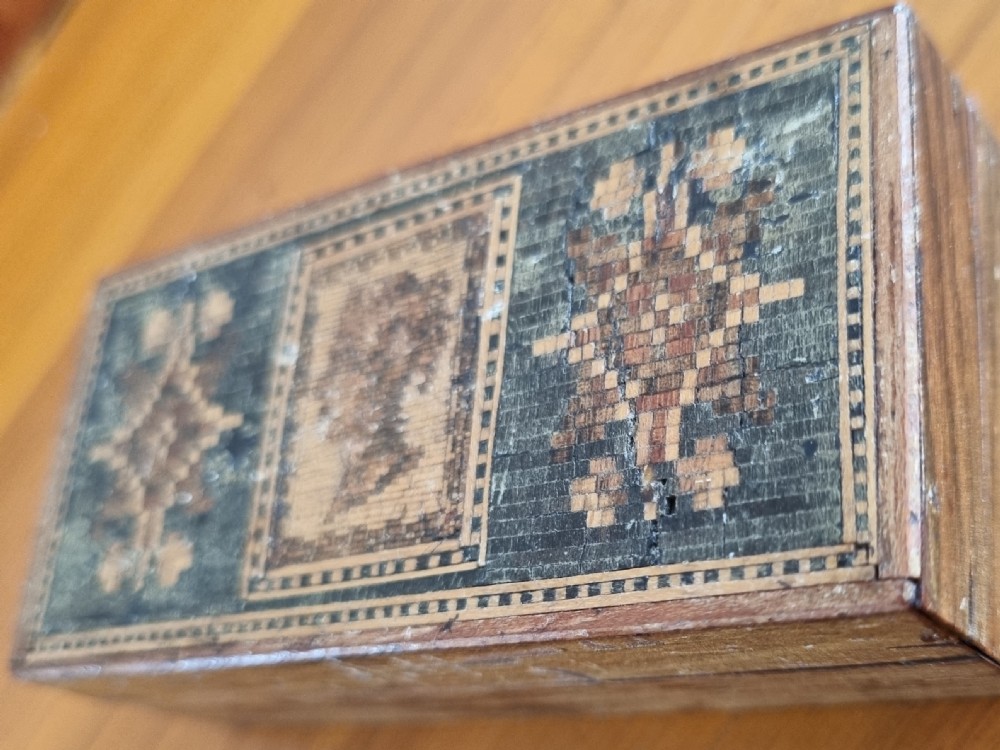 A rectangular nineteenth-century wooden stamp box featuring a detailed Tunbridge ware micro-mosaic lid with a profile silhouette of Young Queen Victoria flanked by geometric mosaic patterns. View II