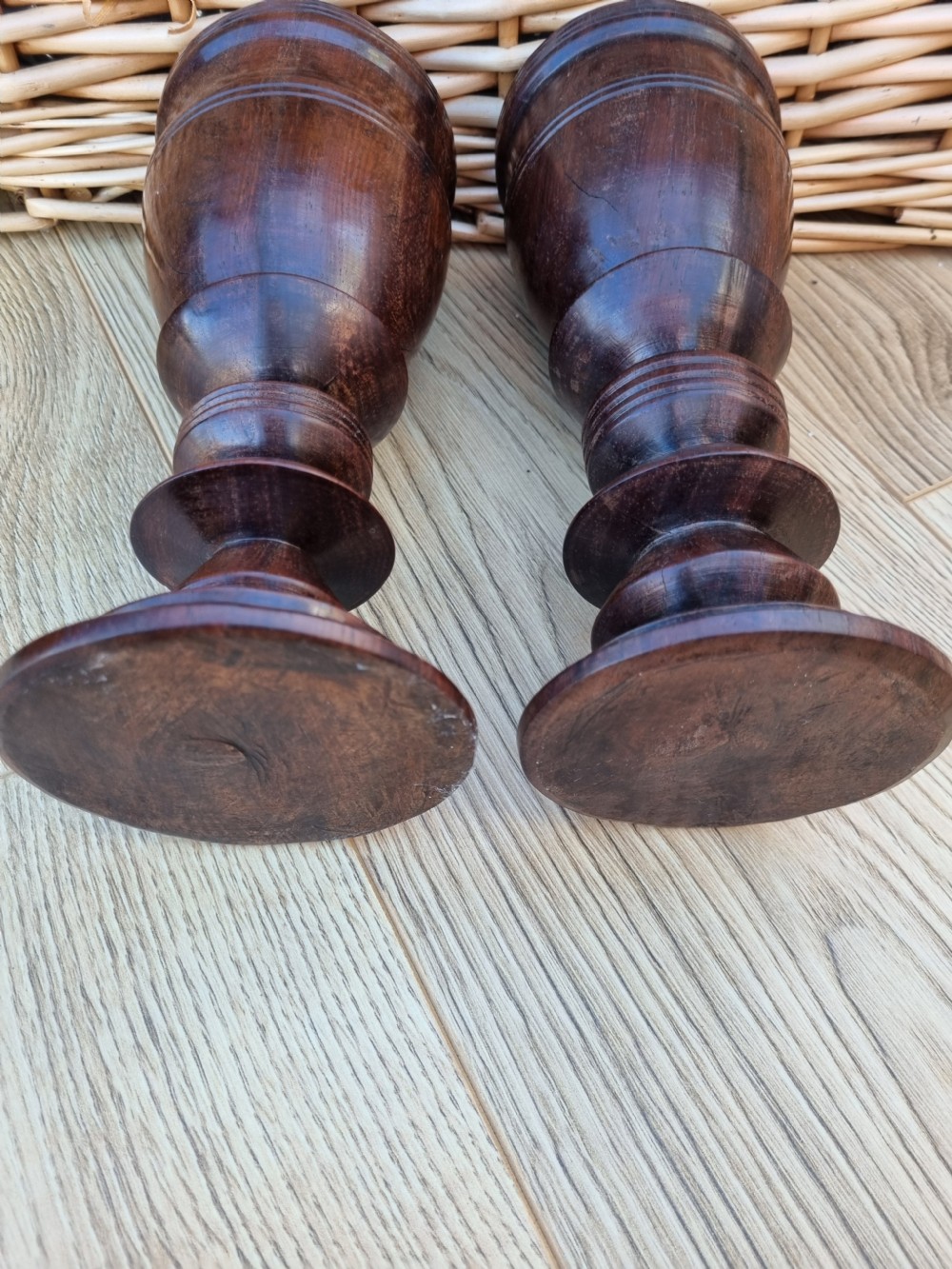 A pair of turned dark walnut goblets featuring stepped stems and moulded rim details. View II