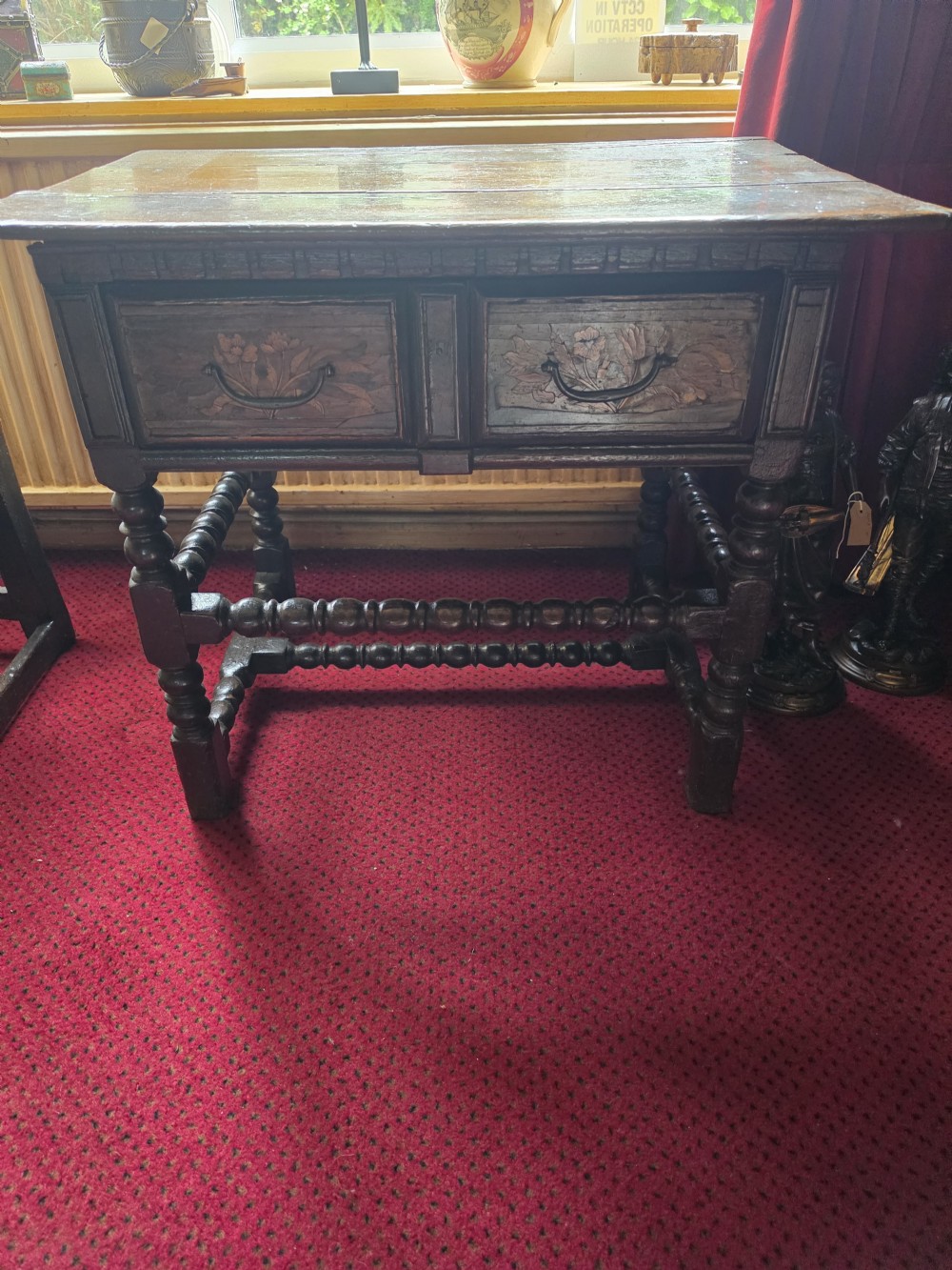 A 17th-century English oak side table featuring two inlaid drawers, turned legs, and lower stretchers. View III