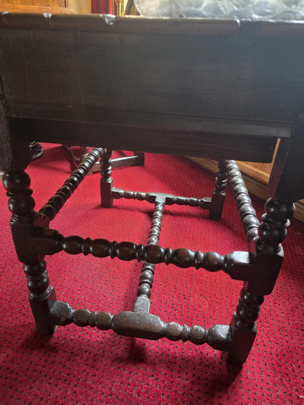 A 17th-century English oak side table featuring two inlaid drawers, turned legs, and lower stretchers. View XIII