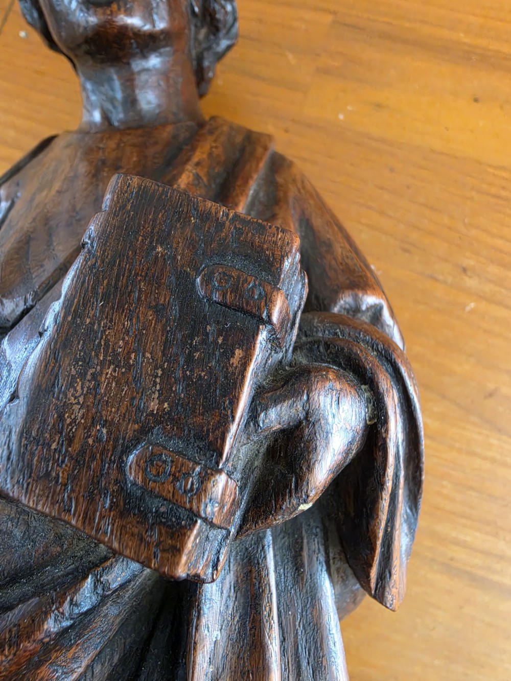 17THC OAK CARVING OF A SCRIBE /MAN  View III