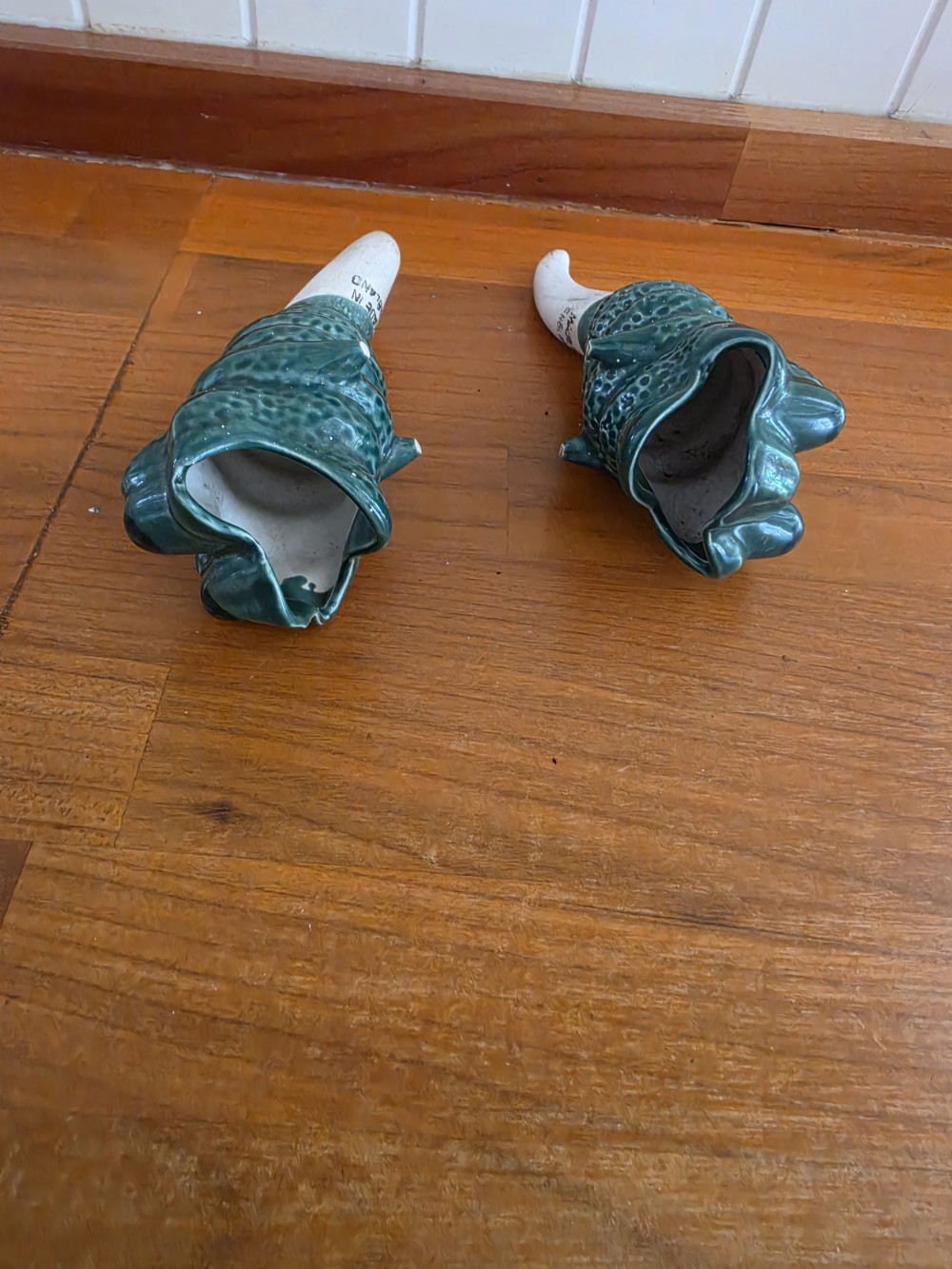 A UNUSUAL PAIR OF GROTESQUE MAJOLICA PLANT WATERERS C1930 View II