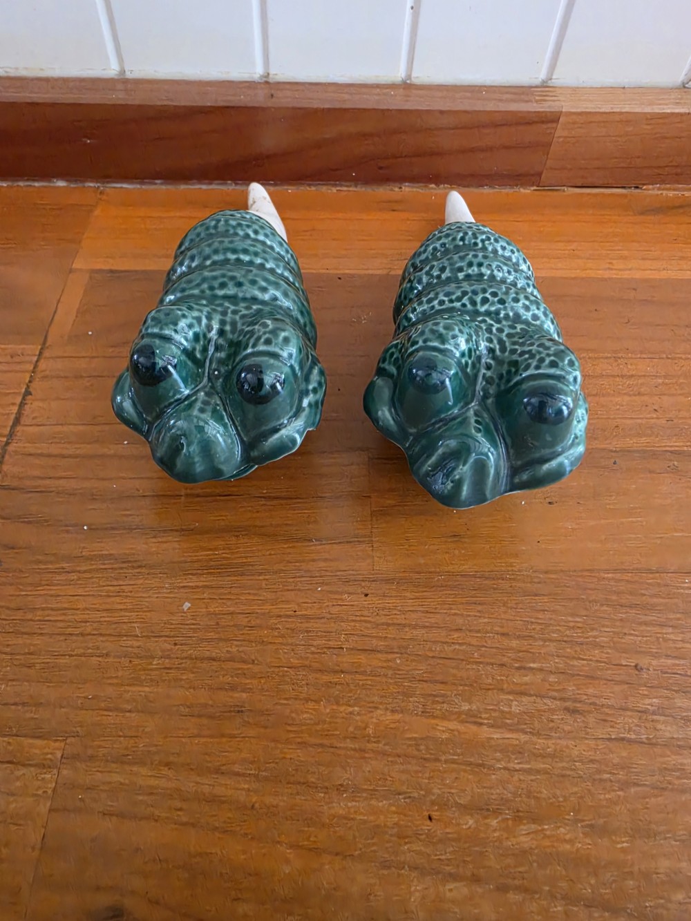 A UNUSUAL PAIR OF GROTESQUE MAJOLICA PLANT WATERERS C1930 View V