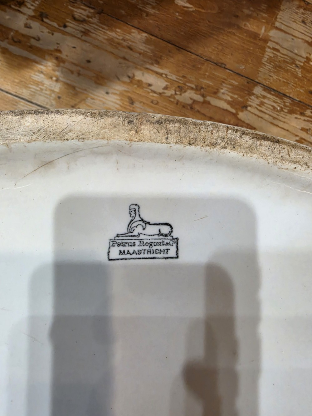 A white glazed ceramic oval tub with twin side handles, featuring bold black capital letters reading MARGARINE across the front. View V