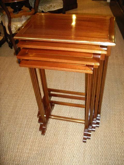 Nest of 4 Mahogany Tables
