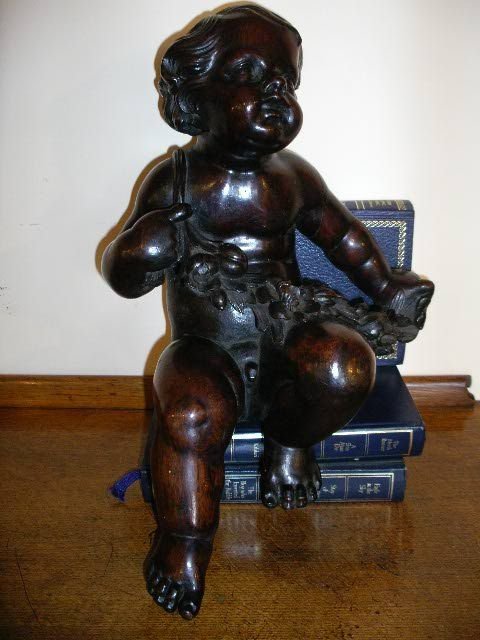 Carved Rosewood Putti