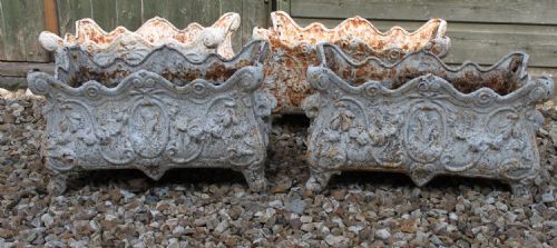 Four Cast Iron Planters
