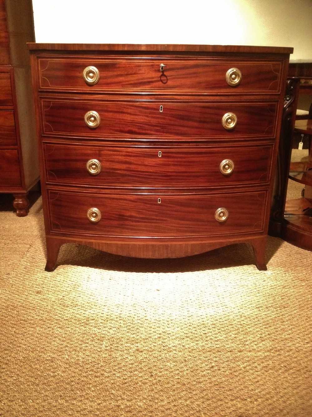 BOW FRONT CHEST OF DRAWERS