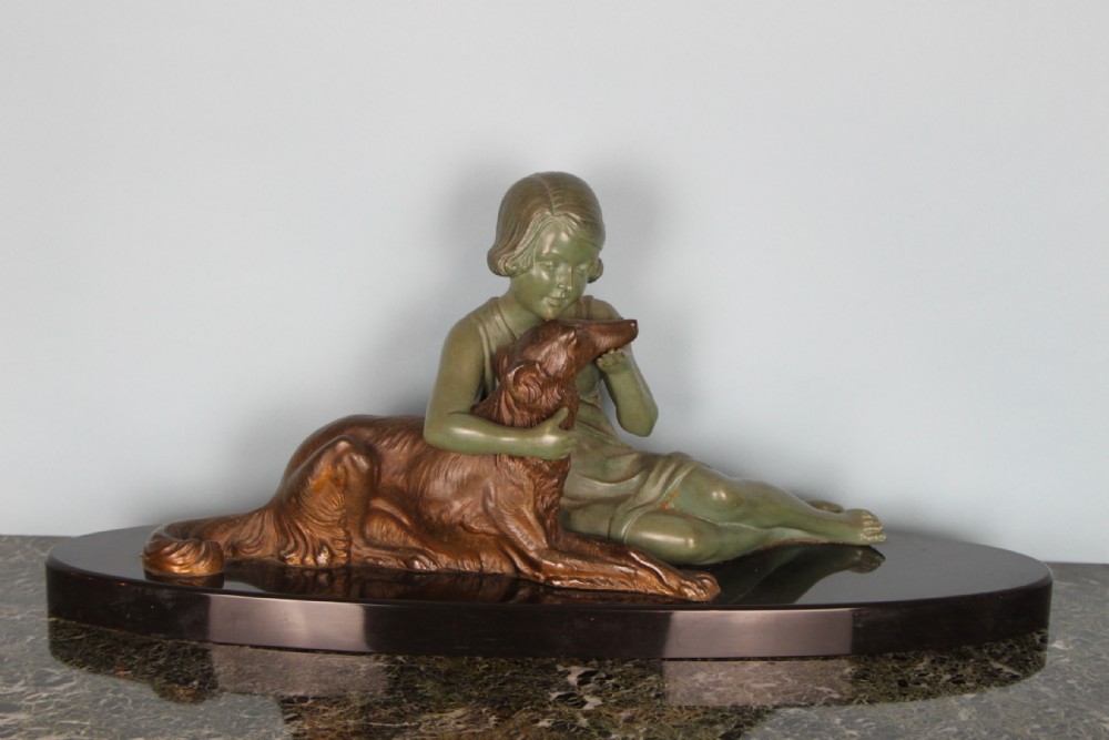 ART DECO SPELTER FIGURE A GIRL AND HER DOG  