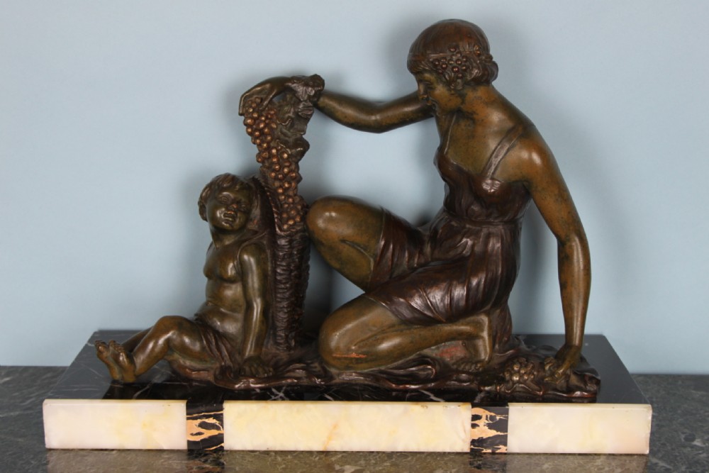 ART DECO SPLETER FIGURE OF A WOMAN AND A CHILD 