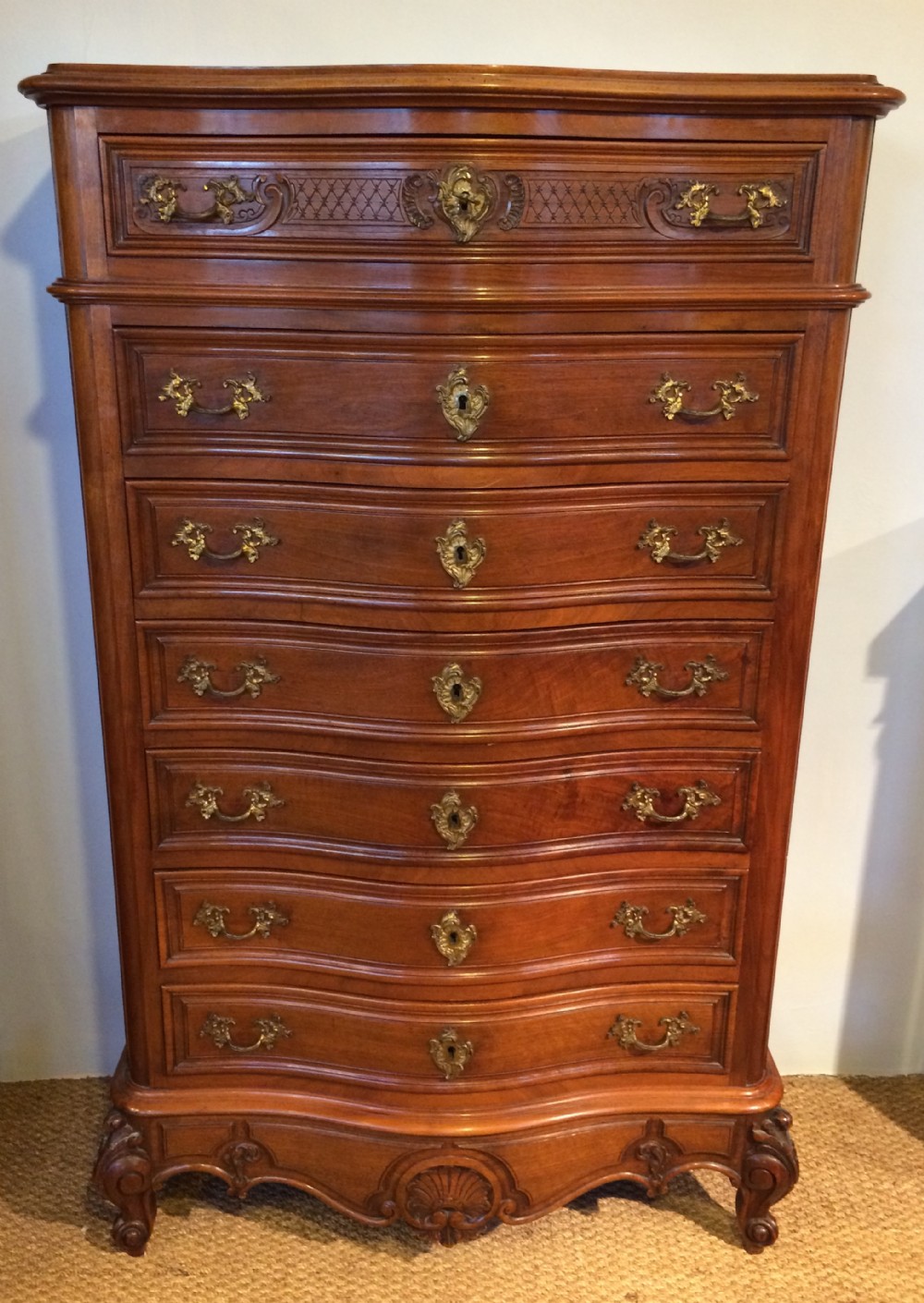 Tall walnut chest of drawers , Semainier 