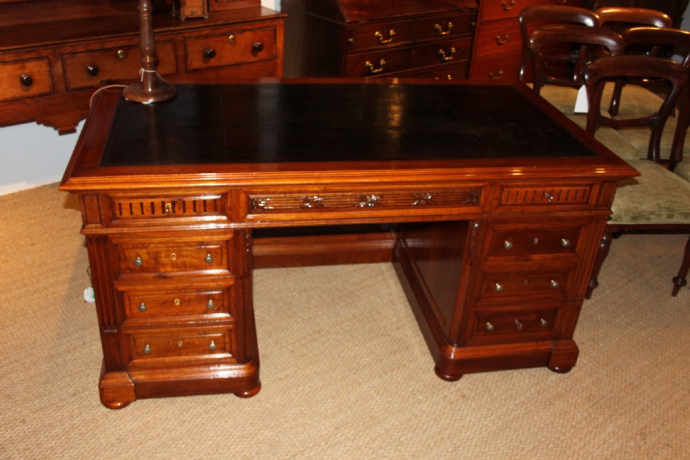 Large walnut pedestal desk 