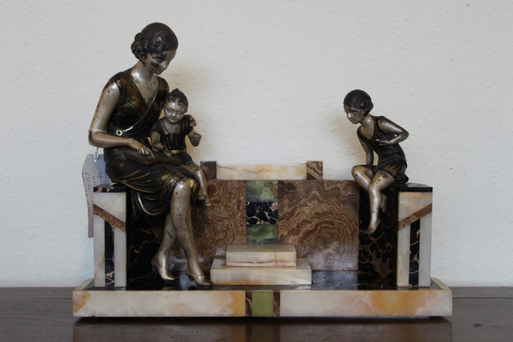 Art deco spelter group by Uriano   