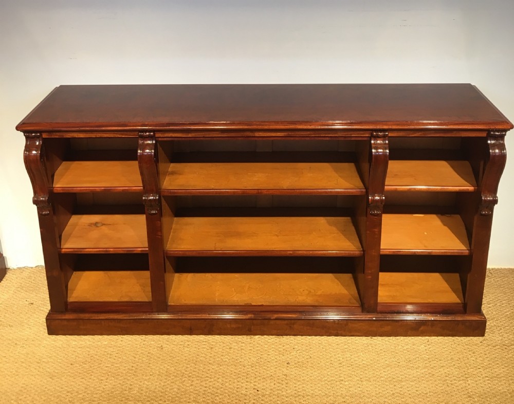 Long low mahogany bookcase  View IV