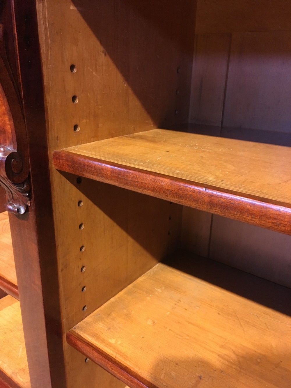 Long low mahogany bookcase  View VI