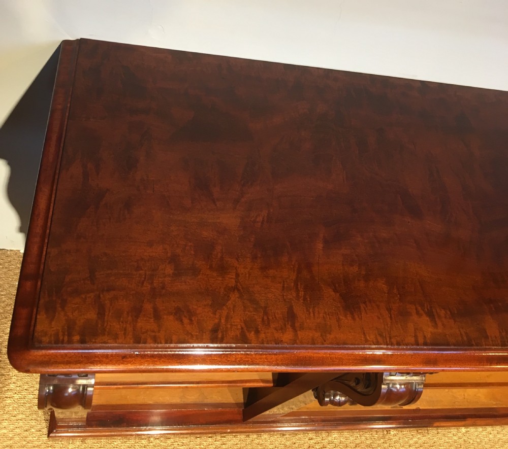 Long low mahogany bookcase  View IX