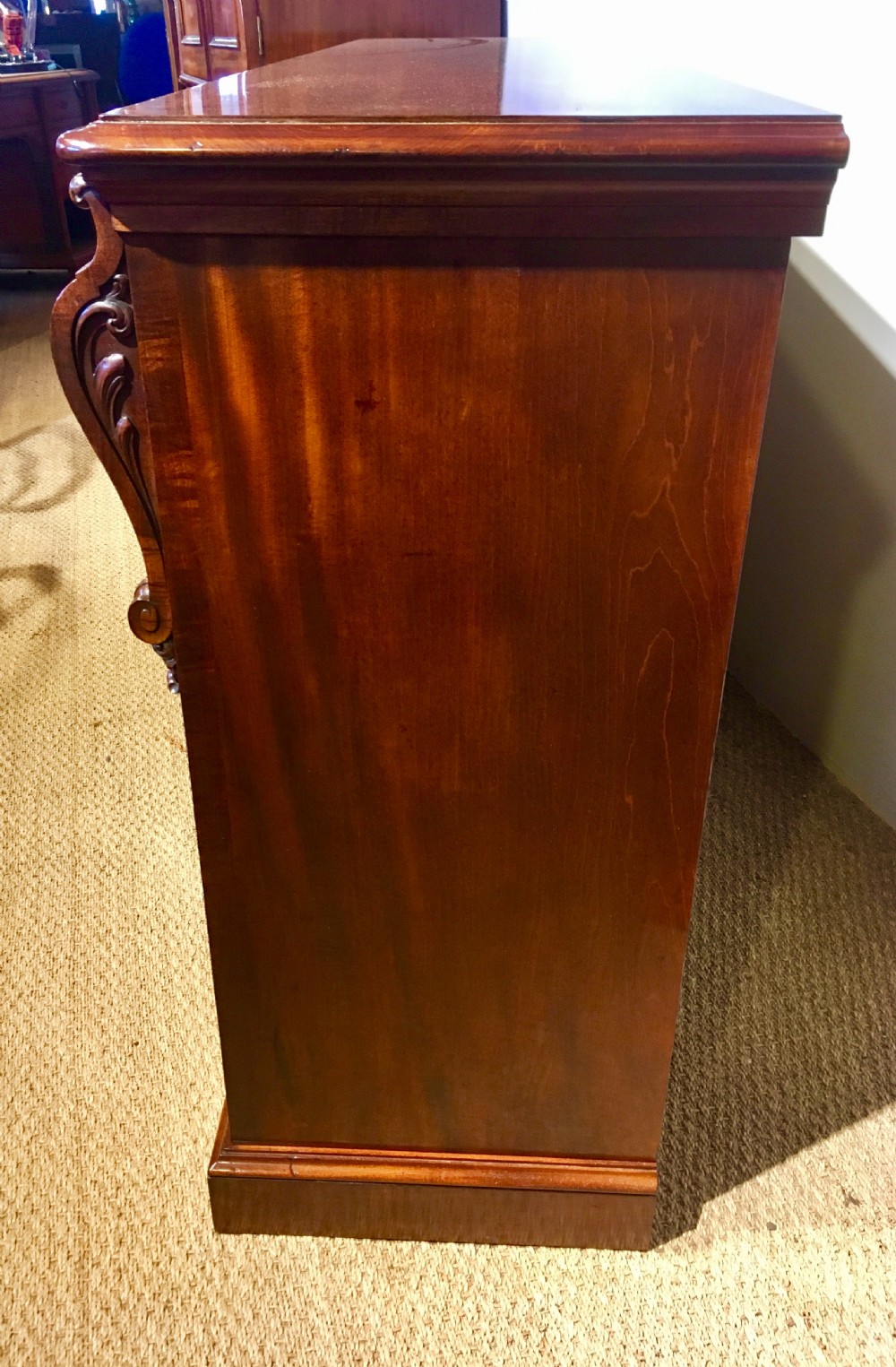 Long low mahogany bookcase  View X