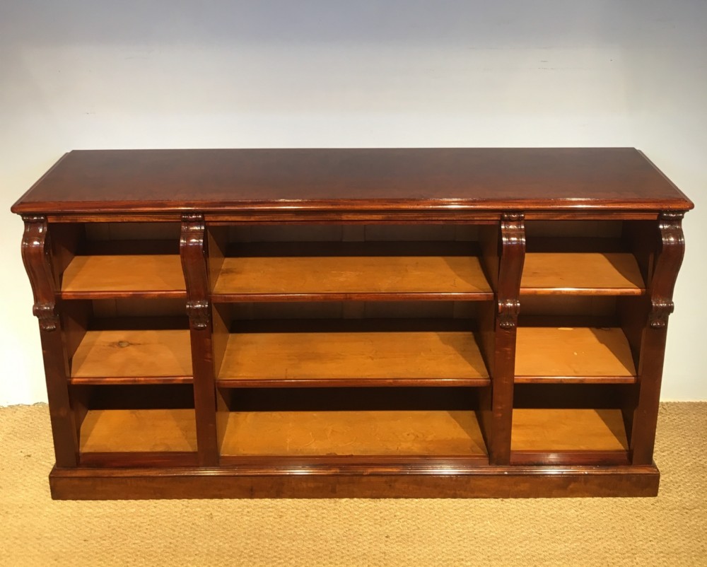 Long low mahogany bookcase 