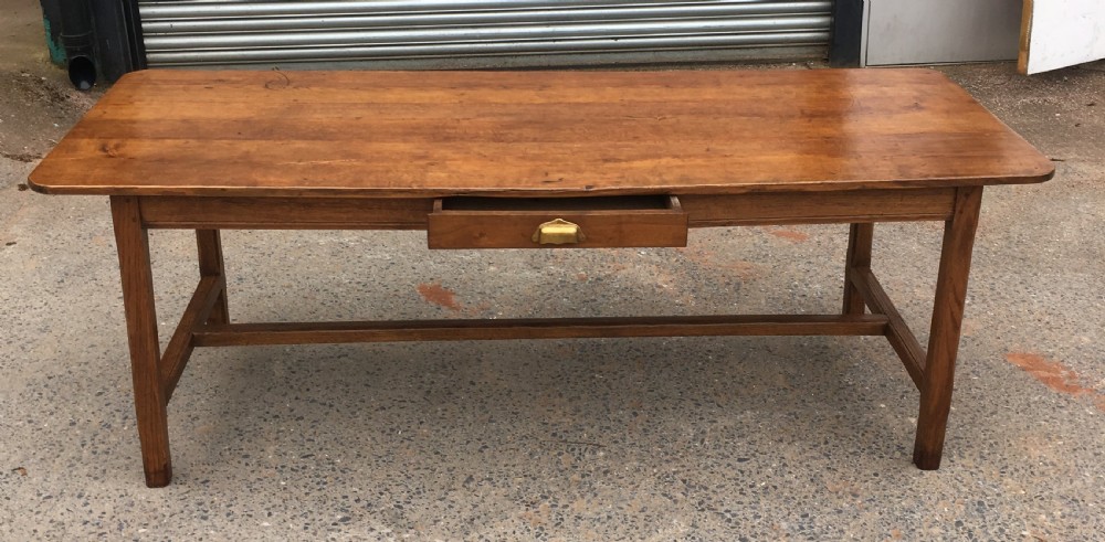 Oak farmhouse table with H stretcher  