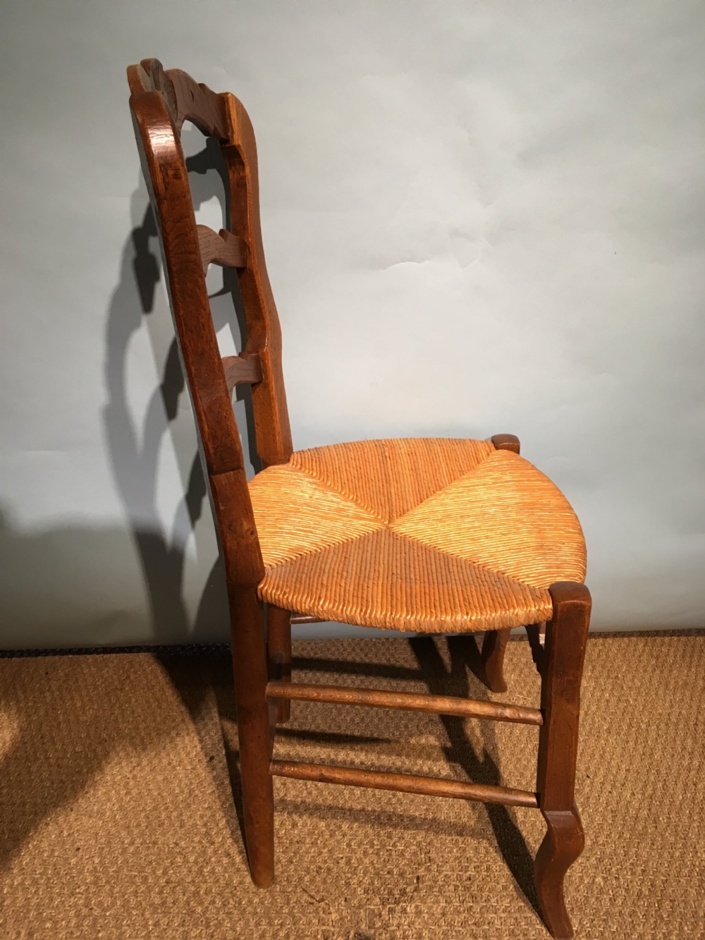 Set of 8 oak and rush seated chairs  View V