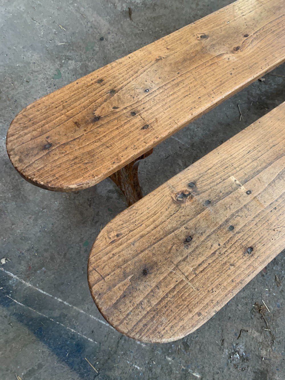 Long pair of chestnut benches   View II