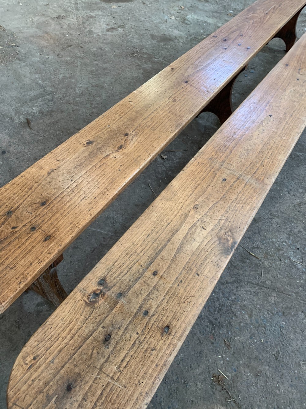 Long pair of chestnut benches   View III