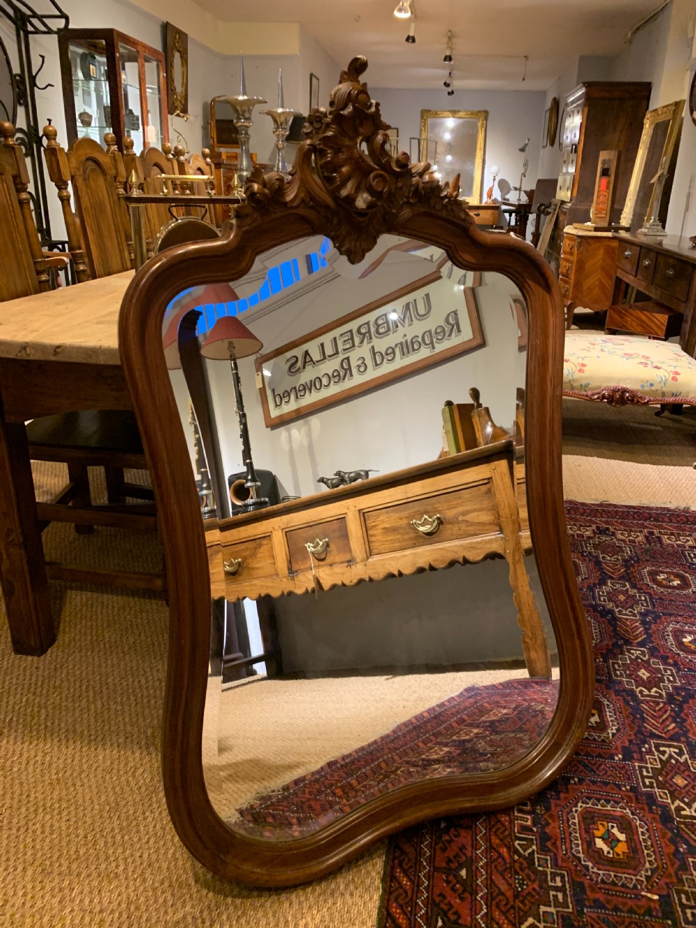 Walnut framed wall mirror  