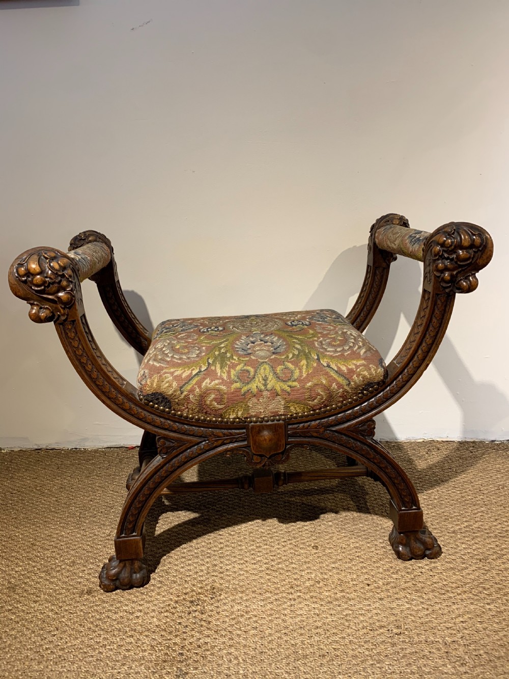 Baronial X framed walnut stool