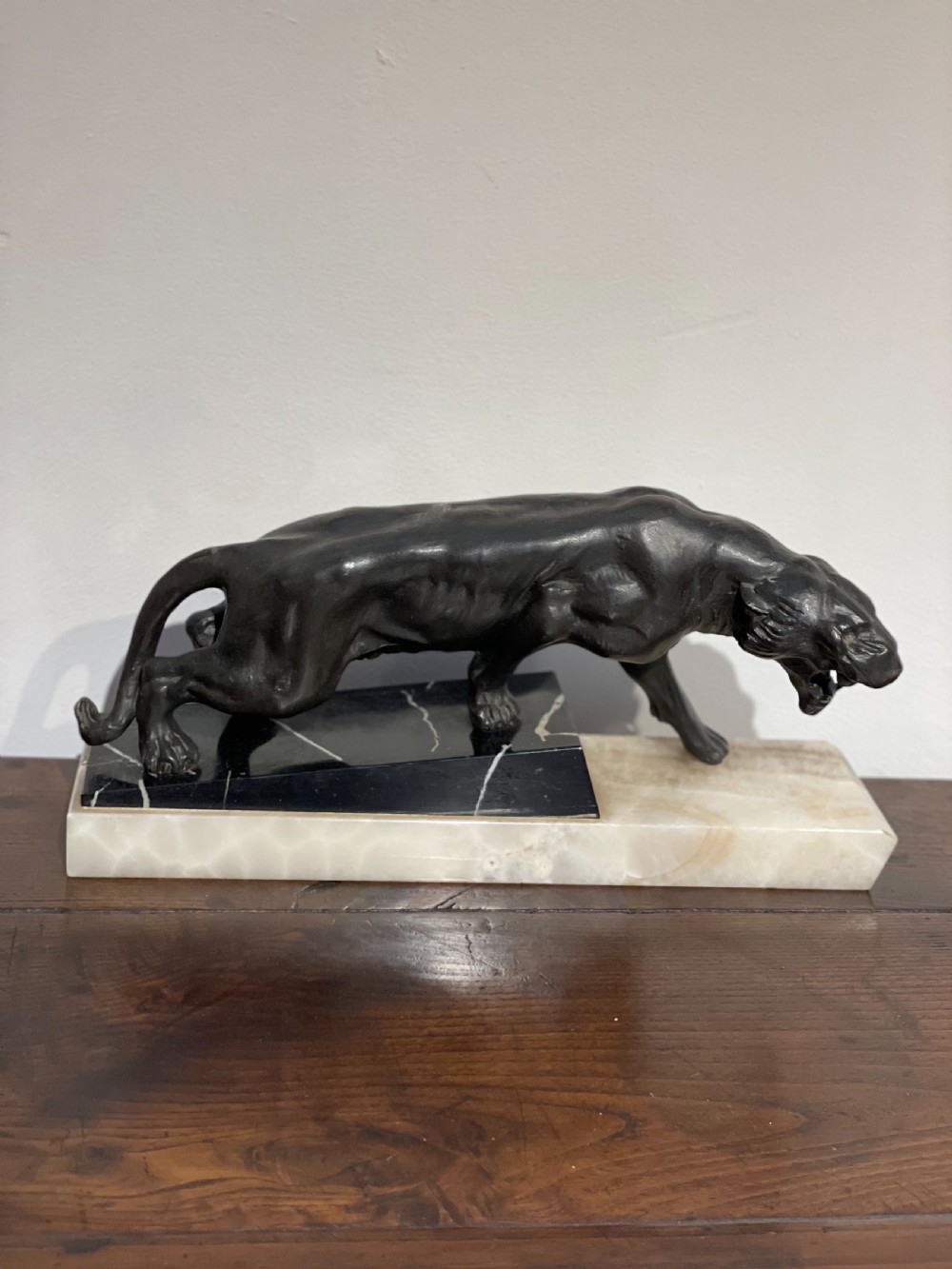 Art Deco spelter lion on marble base 