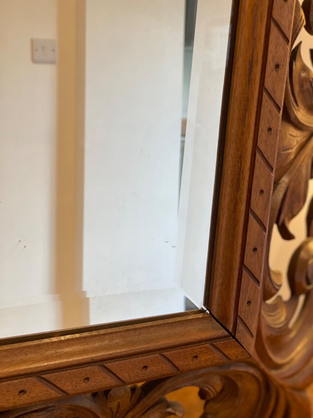 Carved walnut mirror View V