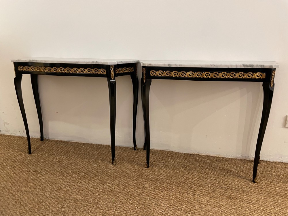 Pair of marble topped console tables  View II