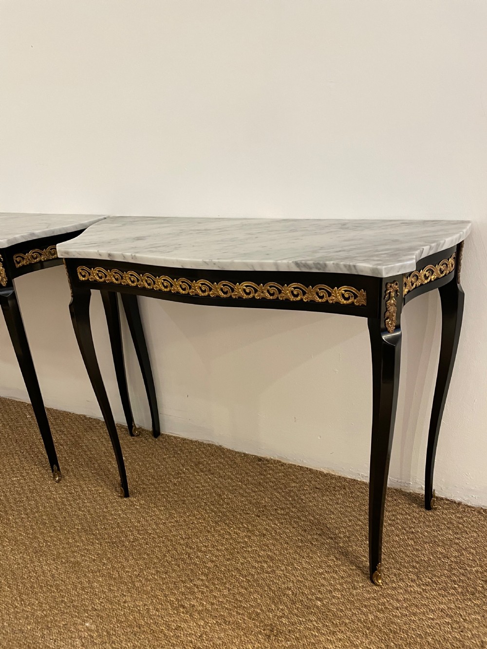 Pair of marble topped console tables  View III