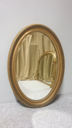 EDWARDIAN GILT OVAL MIRROR