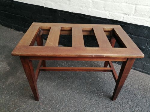 An Edwardian mahogany luggage rack
