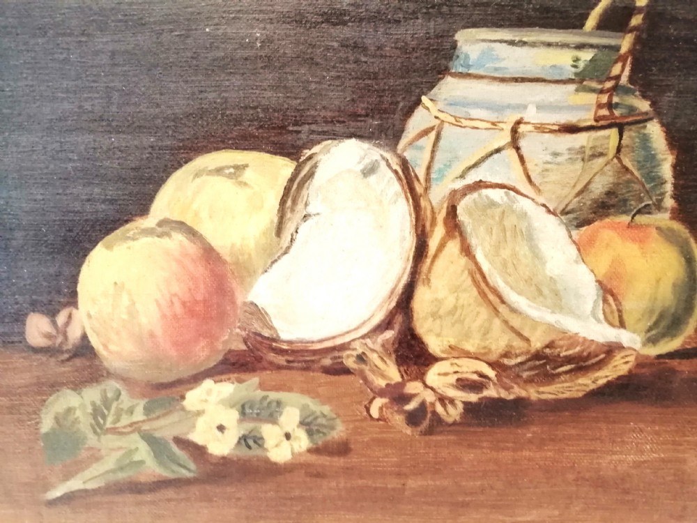 A late 19th-century still life oil painting depicting halved coconuts, apples, a sprig of white blossoms, and a woven vessel on a wooden surface.