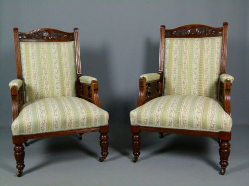Pair of Victorian "His and Hers"carved Walnut Armchairs