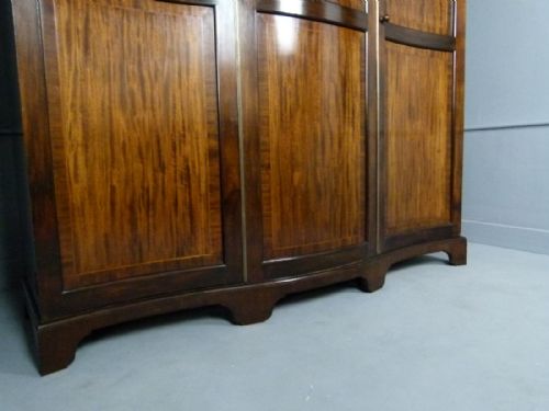 fig 1. Elegant Edwardian Serpentine Mahogany Wardrobe