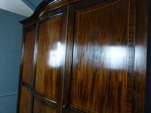 fig 2. Elegant Edwardian Serpentine Mahogany Wardrobe