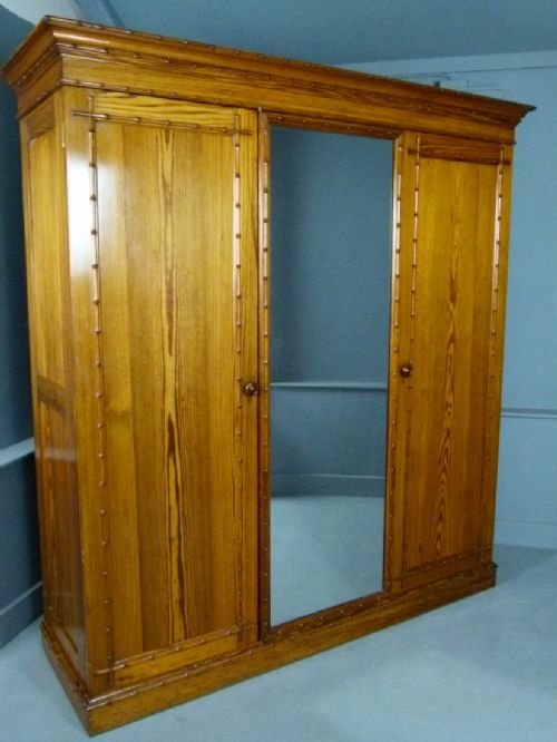 fig 2. Quality Howard & Sons Victorian Pitch Pine Faux Bamboo Triple Wardrobe